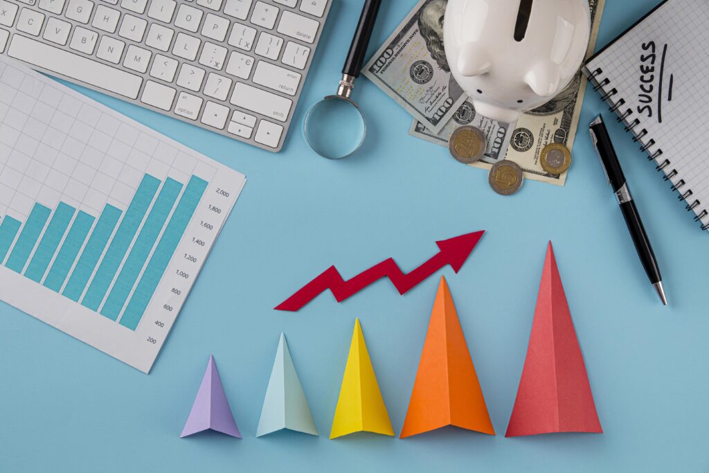 top view business items with growth chart colored cones
